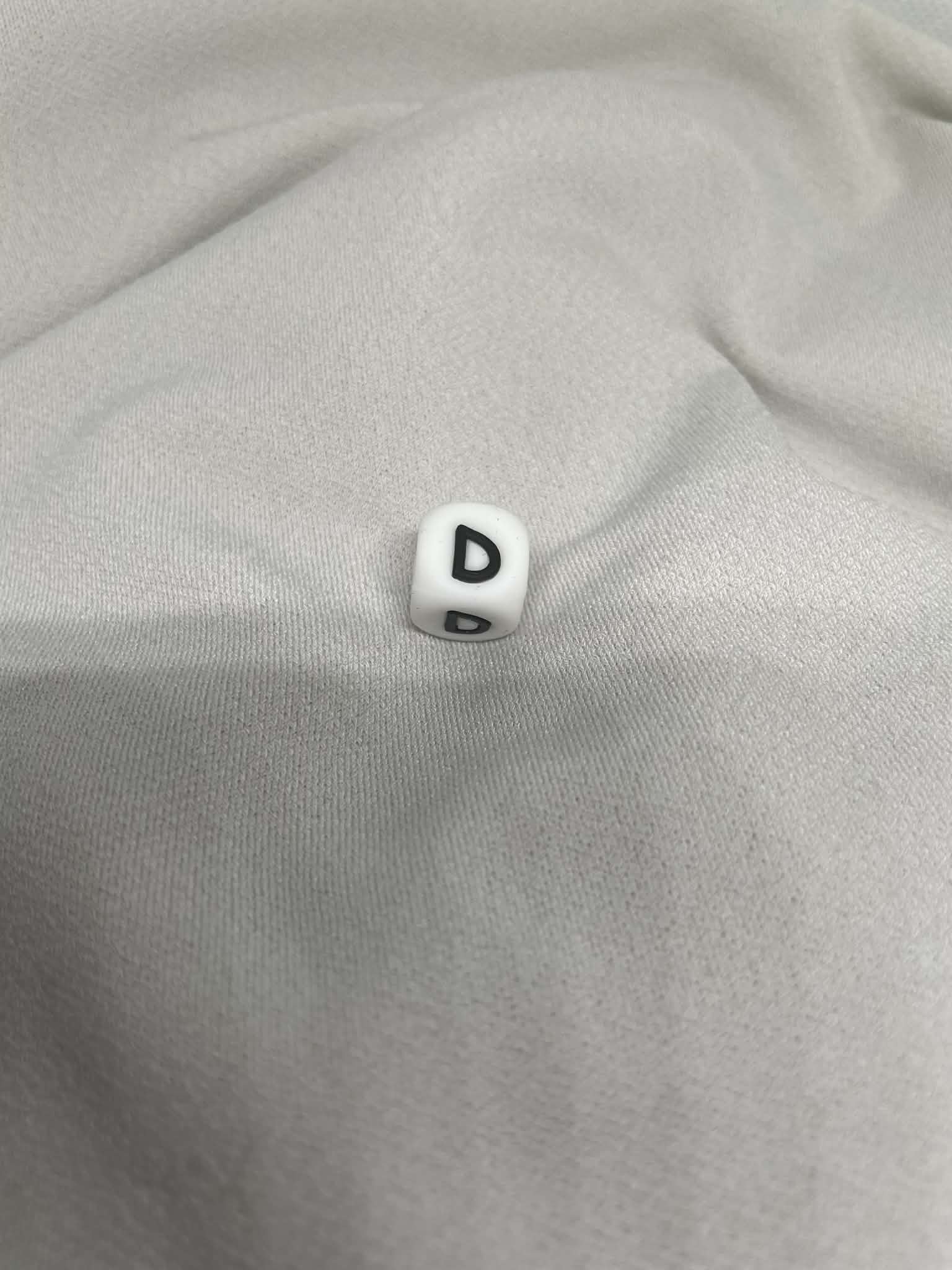 Perles Lettres D