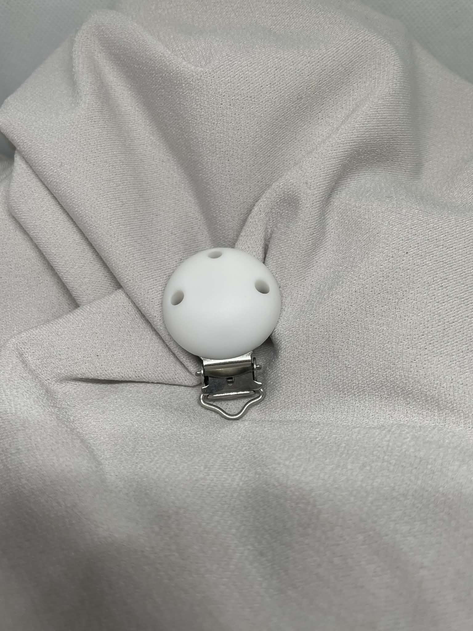 Pince Attache-Sucette